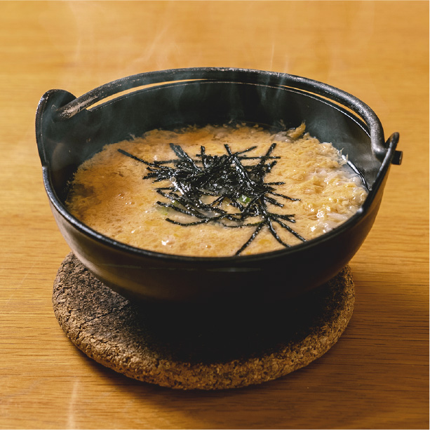 rice gruel containing vegetables, fish, etc., and seasoned with miso or soy sauce